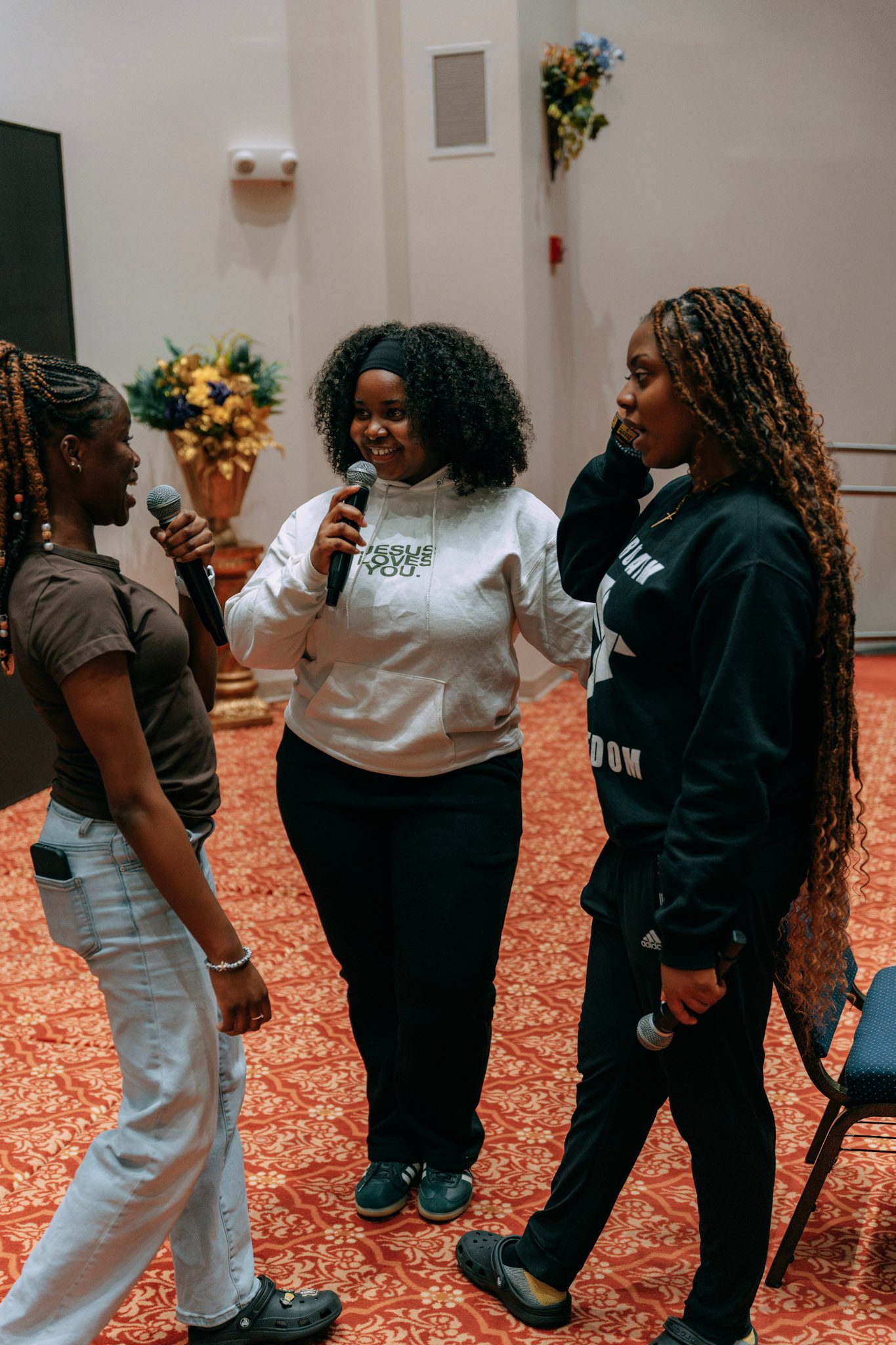 OneVoice leading worship in a warm-lit venue